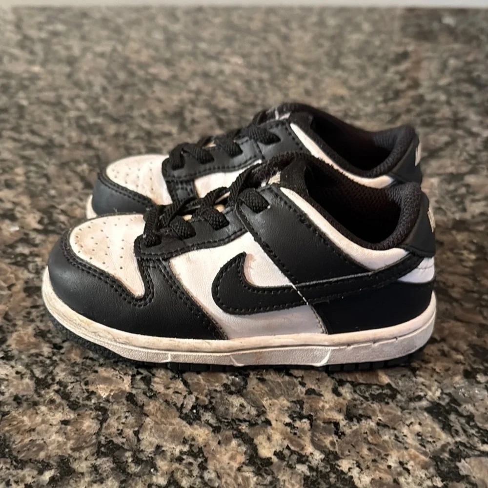 Nike slip on Black and White Sneakers EUC 8.5